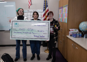 Image of Gay-Straight Alliance members receiving their grant award.